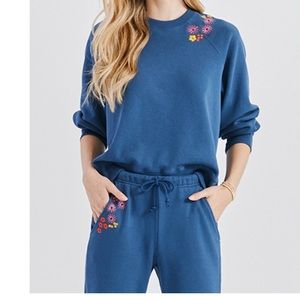 Something Navy blue sweat suit embroidered with florals. Pullover AND Pants
